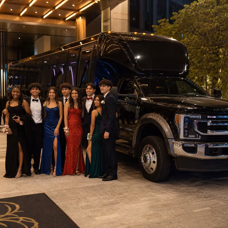 Party bus interior with wraparound leather seating and LED lighting in Oakland