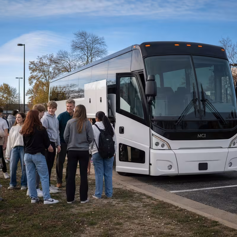 Black Mercedes Sprinter van staged for an Oakland School Transportation group